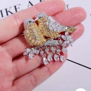 Double bird brooch